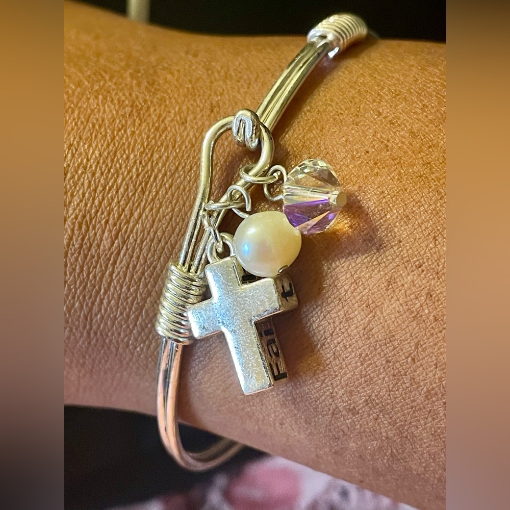 Silver Tone Bangle Bracelet with Cross Charm with Faith on the side. Size 7.5